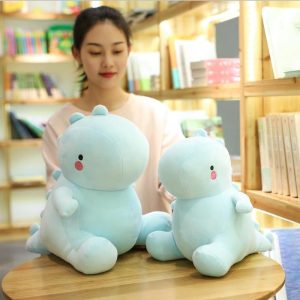 Poupée dinosaure en peluche avec duvet