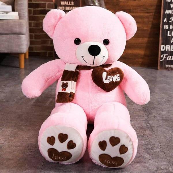 ours-en-peluche-geant-rose_0cb3fb31-6cb6-4c4b-a1eb-760c9de58c10.jpg - PELUCHE POUPEE