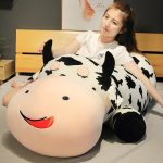 Oreiller en peluche géant en forme de vache couchée