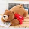 product-image-942707005.jpg Ours brun en peluche aux yeux brillants
